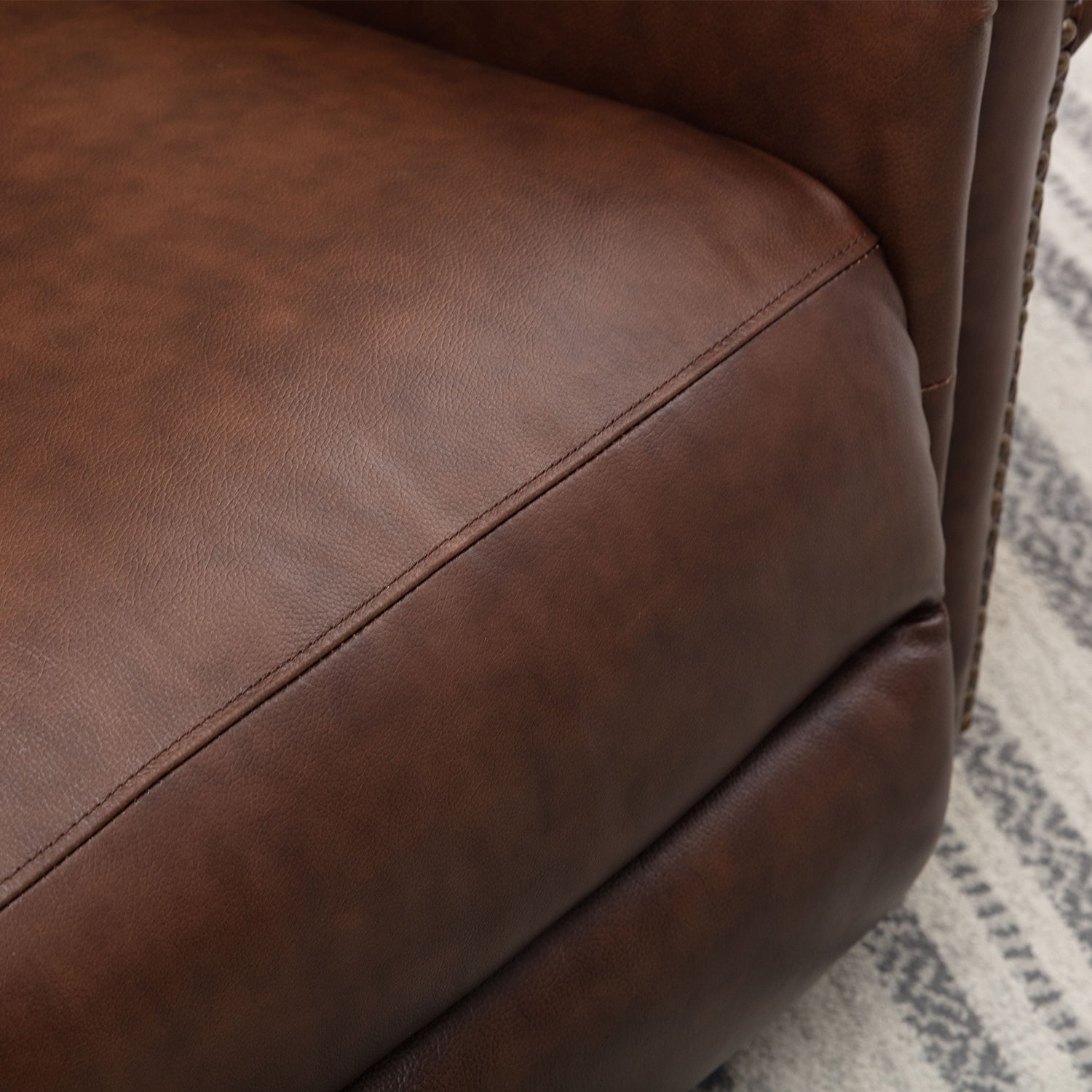 Fauteuil inclinable en cuir véritable avec accoudoirs et dossier confortables