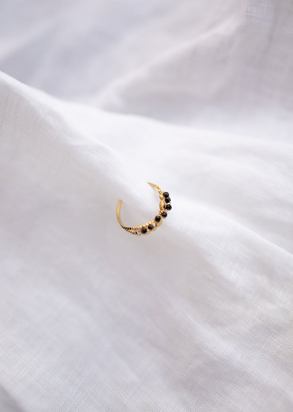 Bague Tily noire et dorée