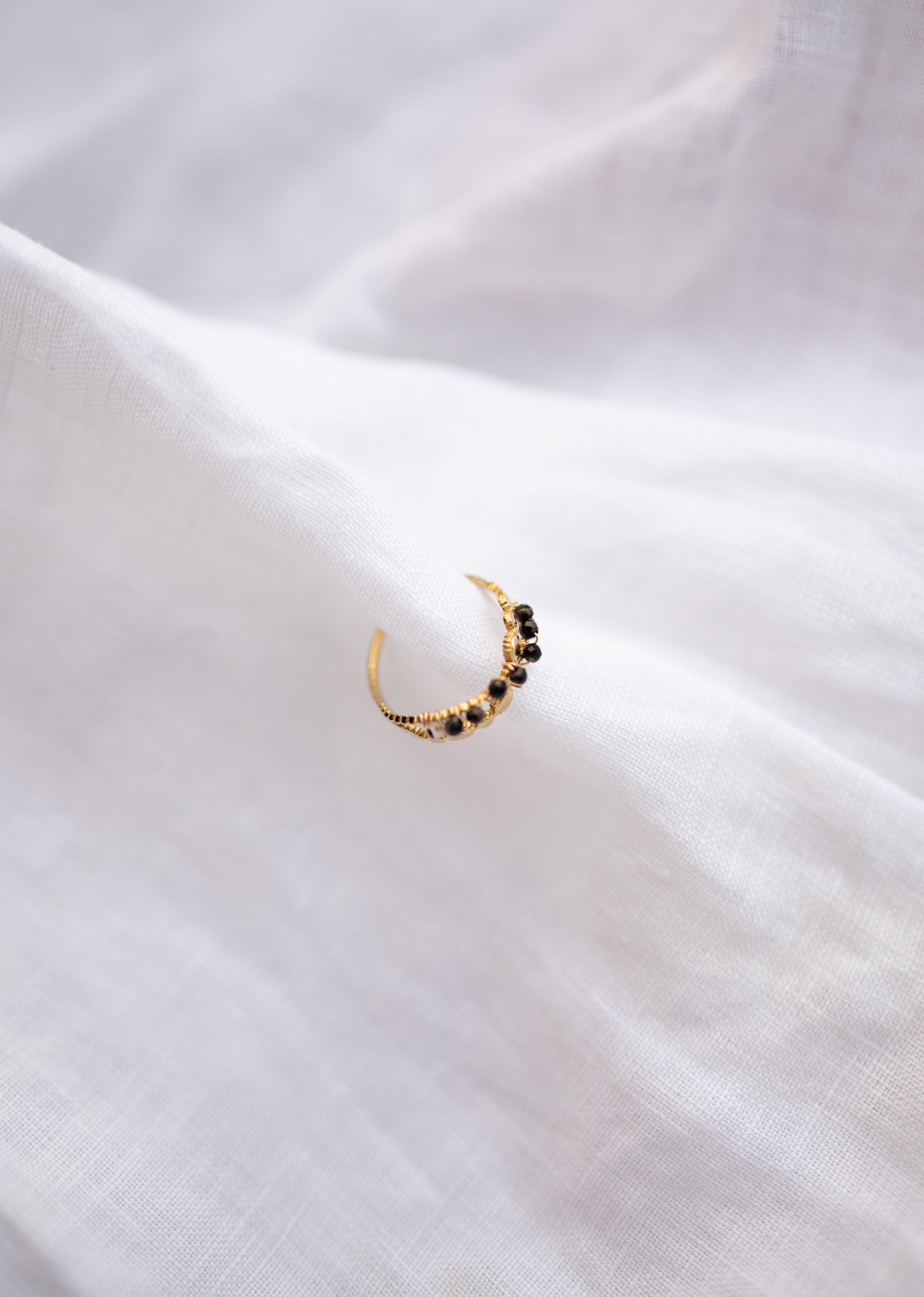 Bague Tily noire et dorée