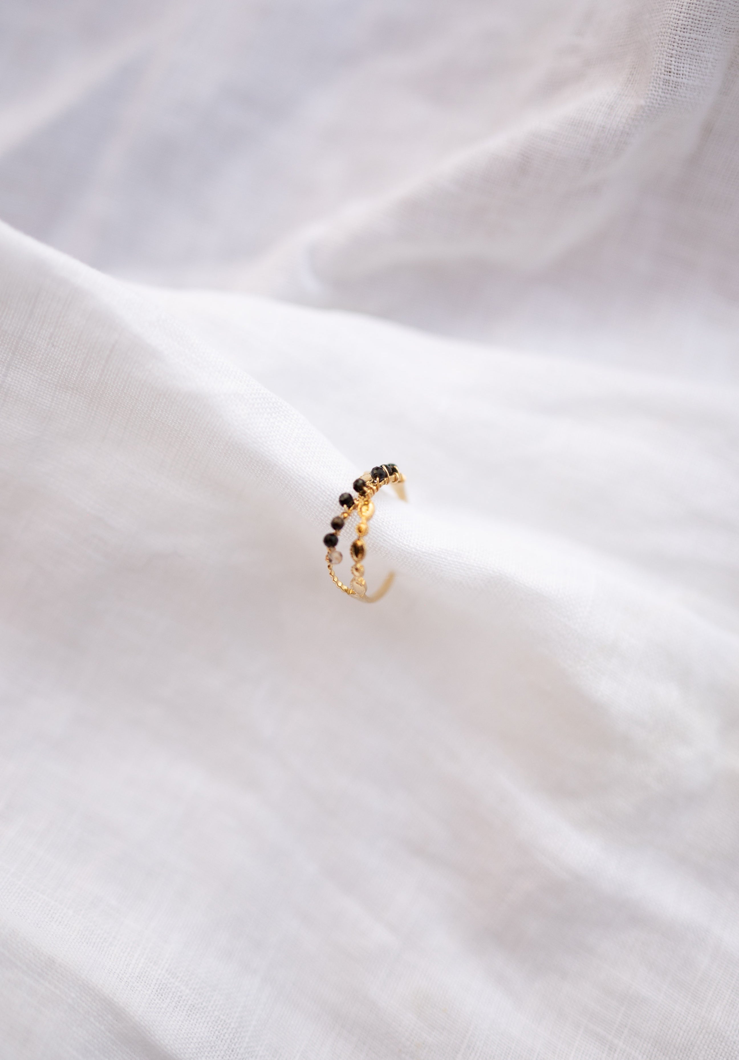 Bague Tily noire et dorée