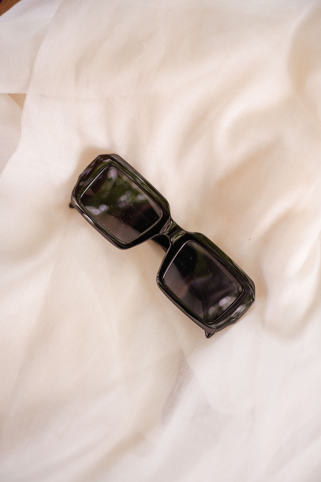 Lunettes de soleil noires Magy