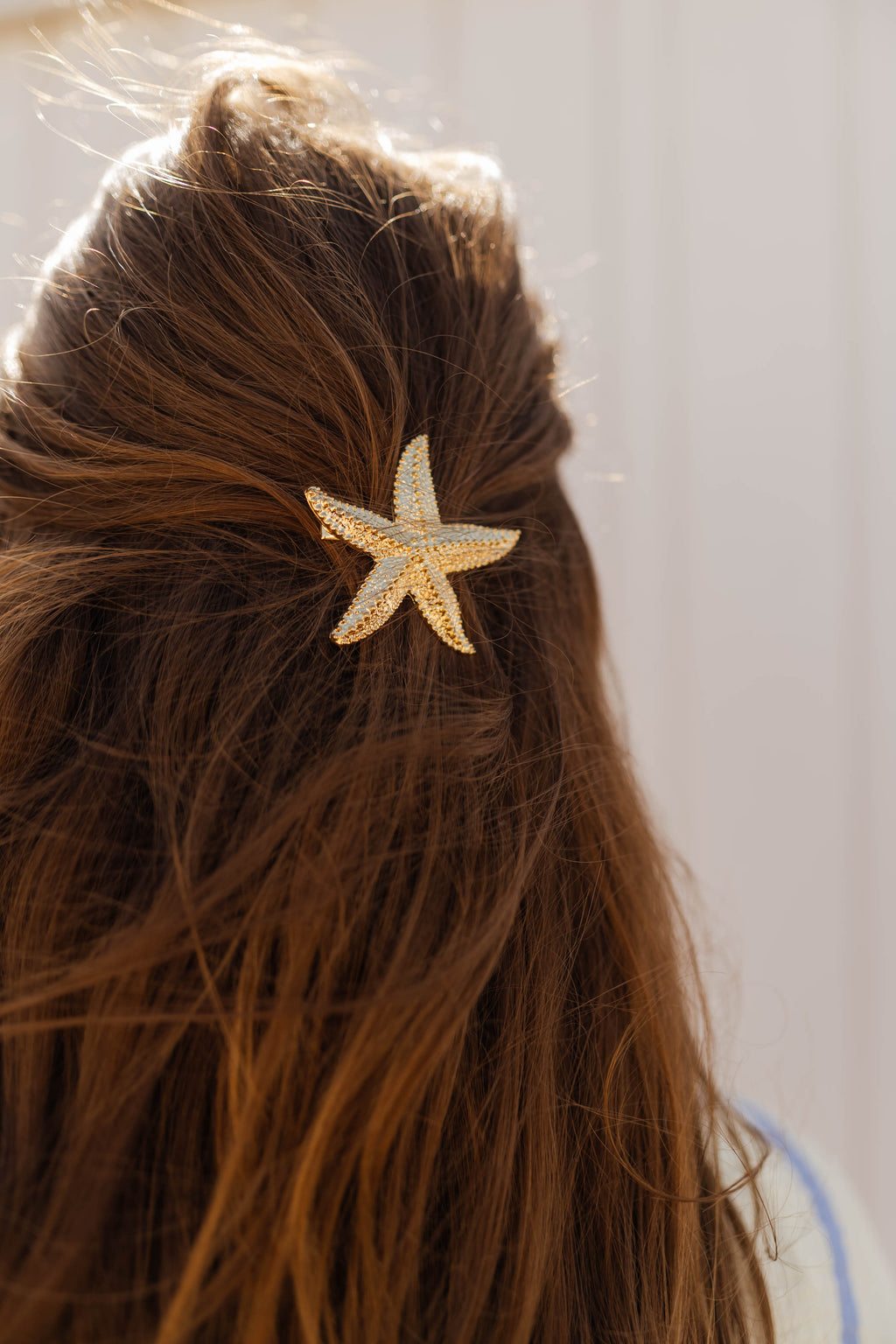 Pince à cheveux étoile de mer dorée