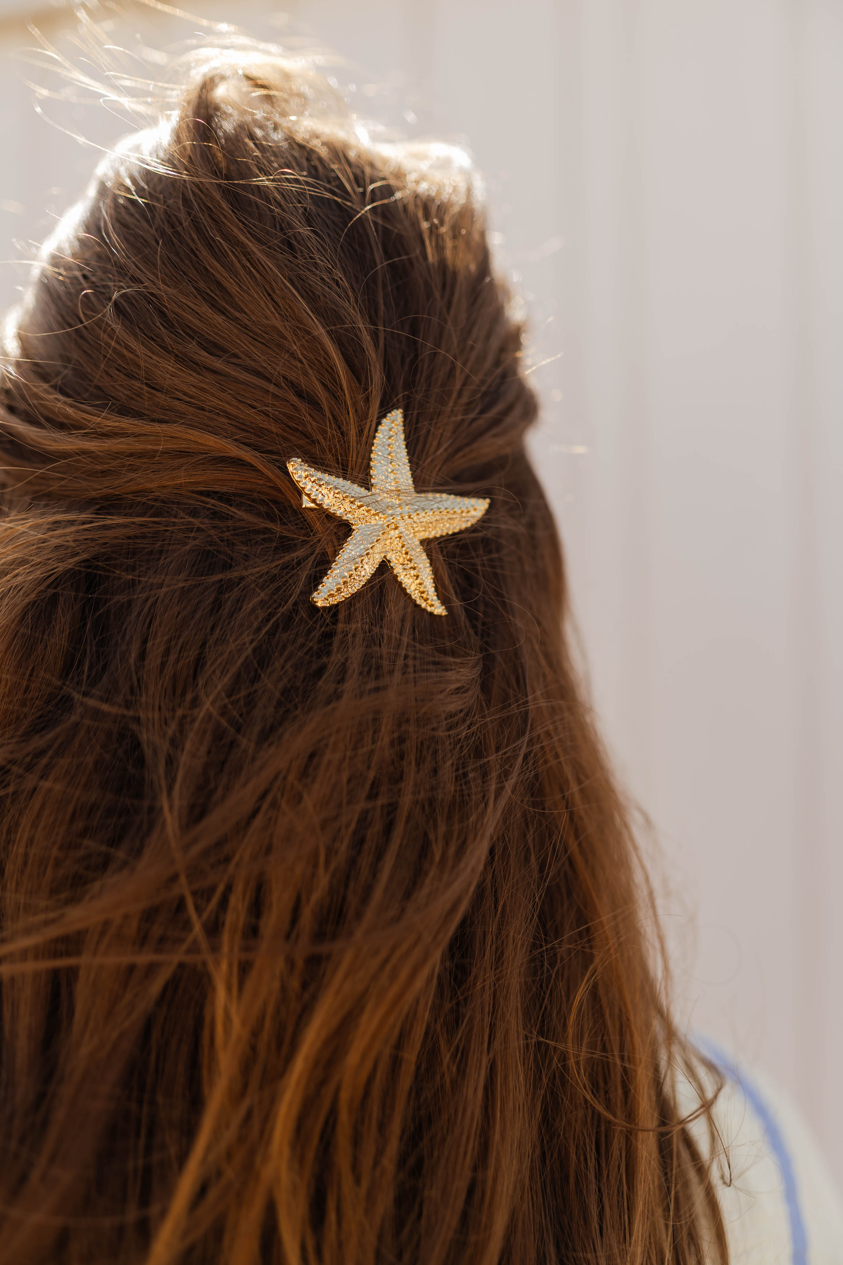 Pince à cheveux étoile de mer dorée